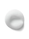 A close-up of fluffy white foaming cleanser texture.